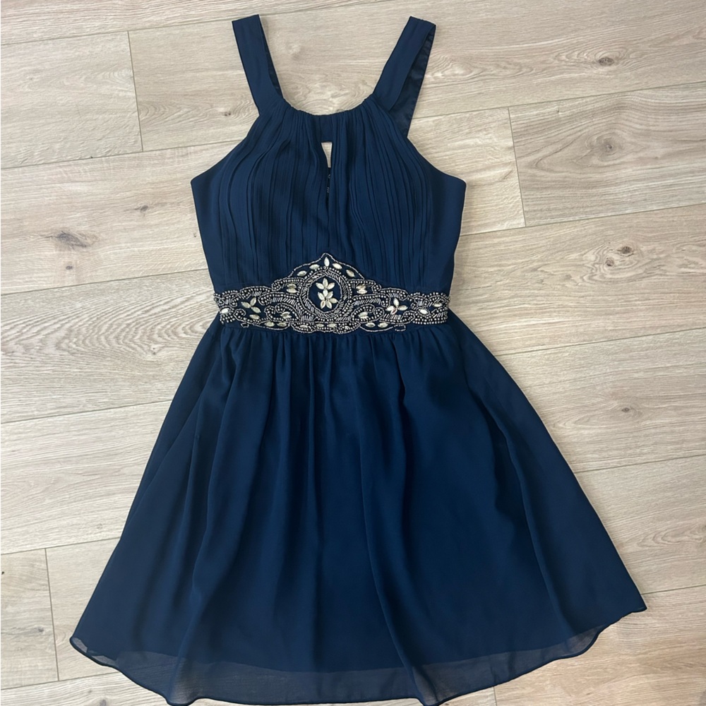 Elegant Navy Dress with Embellished Waist